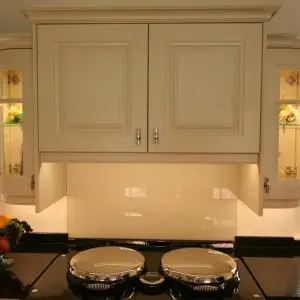Painted-raised-panel-doors-in-Cornell-Almond