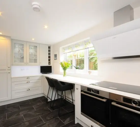 Wakefield shaker kitchen in light grey with Tristone worktops